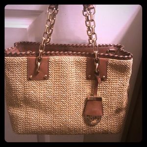 Beautiful, like new Michael Kors straw handbag $55